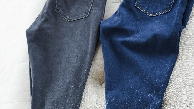 <h4><span>Get Some Jeans</span></h4><p>The first pair of denim I chose to cut were old, and I suggest you start off the same. Now that I consider myself a pro at DIY distressing, I feel more comfortable using a new pair. I also recommend using skinny jeans – but any style denim will work. You can even try this trend on your denim jackets!</p><p>For this tutorial, I’ll be cutting a&nbsp;raw hem on my&nbsp;blue denim&nbsp;and a cutting a&nbsp;step-up hem on my&nbsp;grey denim.</p>